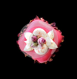 Pink rose bouquet dessert with cream and dried edible flowers