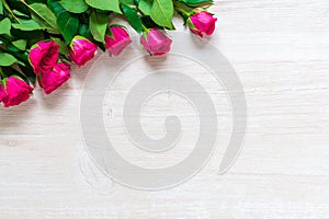 Pink Rose Flowers on wooden table for March 8, International Womens Day, Birthday , Valentines Day or Mothers day - Closeup