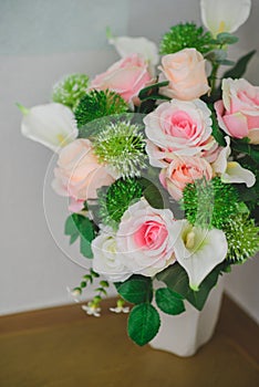 Pink rose on pot decorate in room