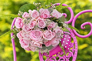 Pink roses bouquet with hearts