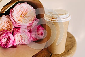 Pink roses and coffee