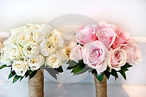 Pink roses and cream roses wedding bouquet of the bride and bridesmaids