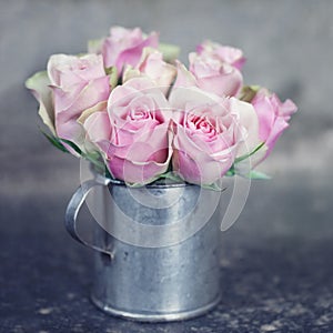 Pink roses in a metal cup1