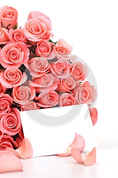 Pink roses with note paper