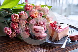 Pink roses and sweet pastrys