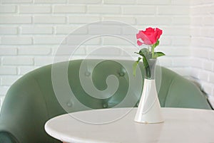 Pink roses on the table, the concept of love and hearts on Valen.