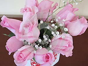 Pink roses for a Valentine`s Day lady.