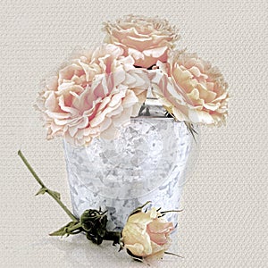 Pink roses in a vase on textured background