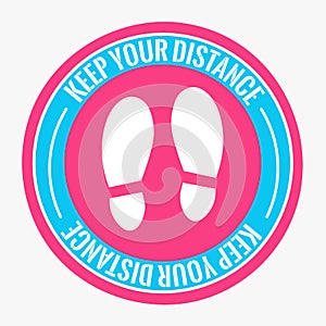 Pink round sticker that tells you to keep your distance avoid spreading corona virus. Protection, medical health. For