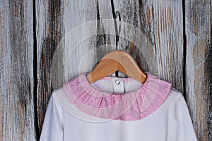 Pink ruffle collar of pajama