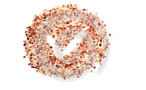 Pink salt isolated on white background. Pink Himalayan salt on white background - isolated.