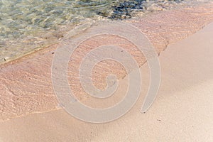 The pink sand on the sandy beach , Europe, Greece, Crete, Balos, By the Mediterranean Sea, in summer, on a sunny day