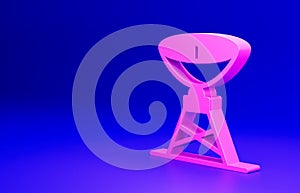 Pink Satellite dish icon isolated on blue background. Radio antenna, astronomy and space research. Minimalism concept
