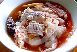 Pink seafood flat noodles