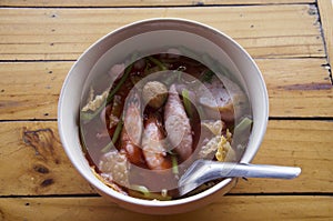 Pink seafood flat noodles called yentafo in Thailand