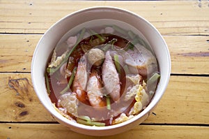 Pink seafood flat noodles called yentafo in Thailand