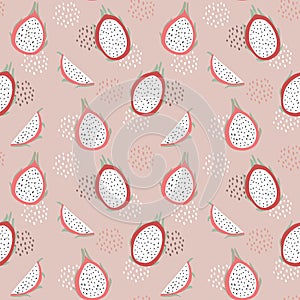 Pink seamless pattern with sliced pitaya, dragon fruit and dots. Summer textile, fabric or scrapbooking design with