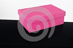 Pink shoe box black floor