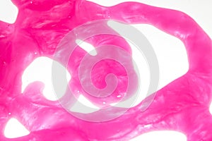 Pink Shower Gel Liquid Slime Poured on a White background