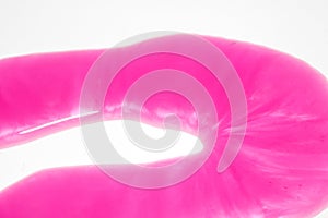 Pink Shower Gel Liquid Slime Poured on a White background