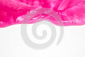 Pink Shower Gel Liquid Slime Poured on a White background