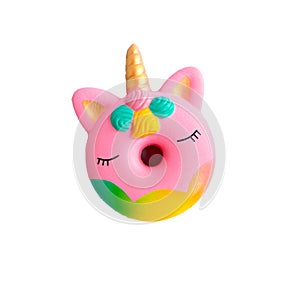 pink silicone donut unicorn anti-stress squish toy on white