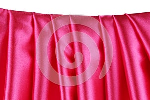 Pink silk drape.