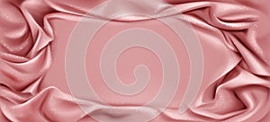 Pink silk draped fabric background with glittering