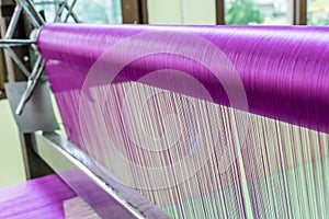 Pink silk weaving.