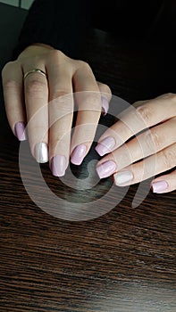 Pink and silver gel polish cover with shimmer, both hands