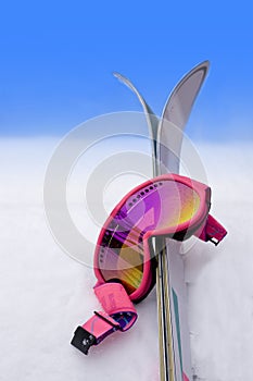 Pink Ski Goggles and Skis