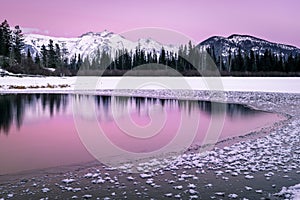 Pink sky over Vermillion Lake in Banff National Park in Canada