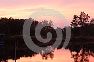 Pink sky and river at Thailand