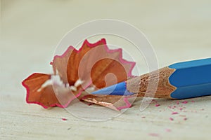 Pink slices of blue sharpened pencil - Concept of gender identity