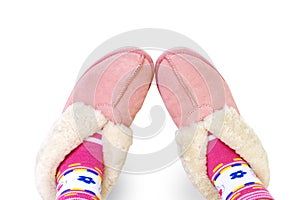 Pink slippers female feet