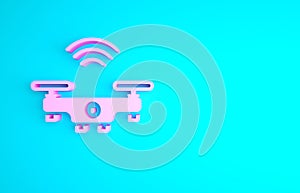 Pink Smart drone system icon isolated on blue background. Quadrocopter with video and photo camera symbol. Minimalism