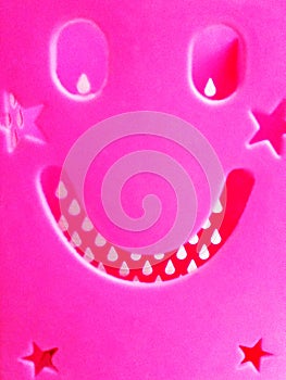 Pink smile as a symbol of good mood