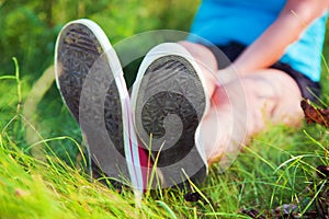 Pink sneakers on girl legs