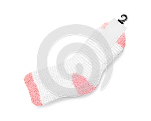 Pink Socks with blank label on white background. Winter sock made from soft fabric.