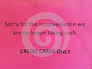 Pink sorry for the inconvenience we are no longer taking cash credit cards only sign