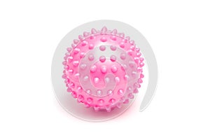 Pink spiky massage ball on white background