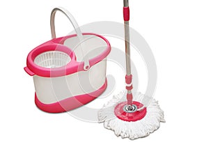 Pink spin mop with bucket on white background