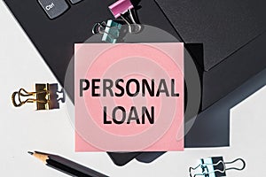 Pink Sticky Note With the Words Personal Loan