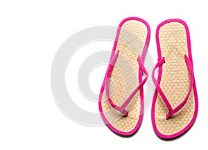 Pink and Straw flip-flop sandalw on a white background