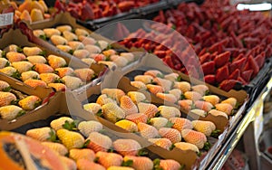 Pink Strawberry on the farmers market stall