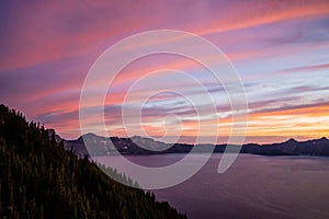 Pink Streaks Light up the Sky Over Crater Lake