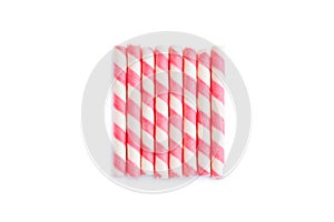 Pink striped wafer stick rolls on white background