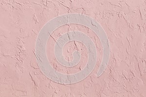 Pink structured plaster wall
