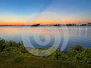 pink sunset over Mississippi River in New Orleans