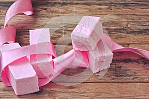 Pink sweet pastille with silk ribbon